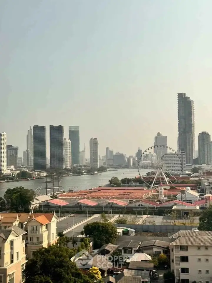Stunning cityscape view with river and skyline, perfect for urban living enthusiasts.