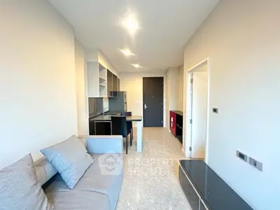 Modern apartment interior with open kitchen and cozy living area