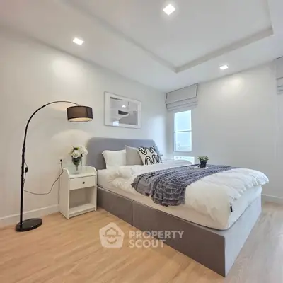 Modern bedroom with stylish decor and cozy ambiance