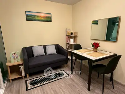 Cozy living room with modern decor and dining area