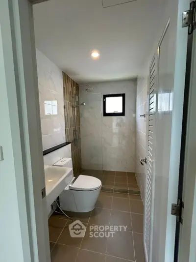 Modern bathroom with sleek design and contemporary fixtures.