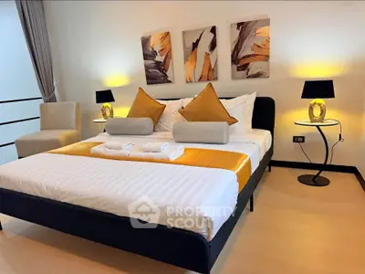 Luxurious bedroom with modern decor and ambient lighting, featuring a stylish bed and elegant furnishings.