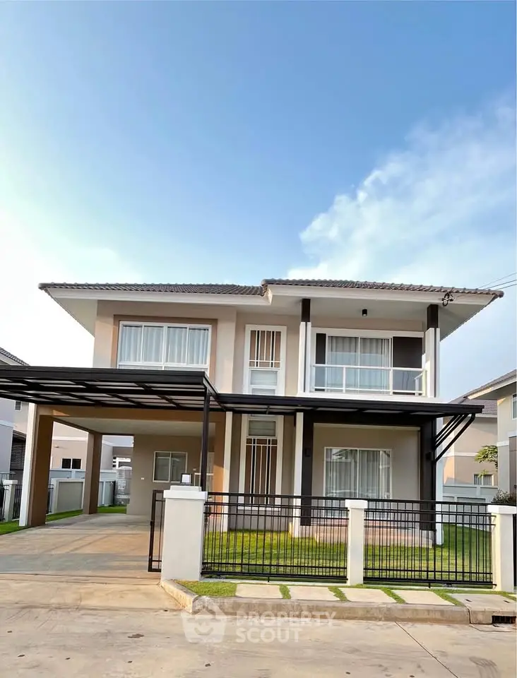 Modern two-story house with spacious driveway and sleek design in a serene neighborhood.