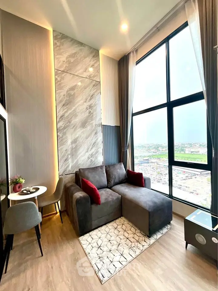 Luxurious high-rise living room with stunning city view and modern decor