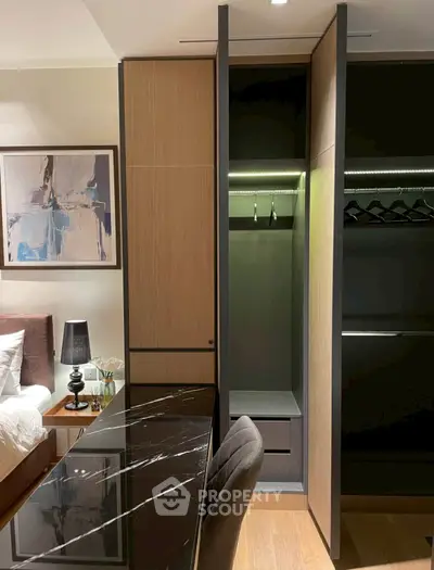 Modern bedroom with sleek wardrobe and stylish decor