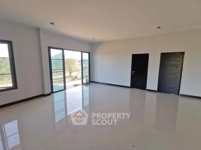 Spacious modern room with large windows and glossy tiled floor, perfect for customization.