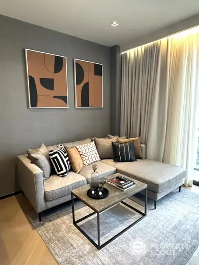 Stylish modern living room with cozy sectional sofa and abstract art decor