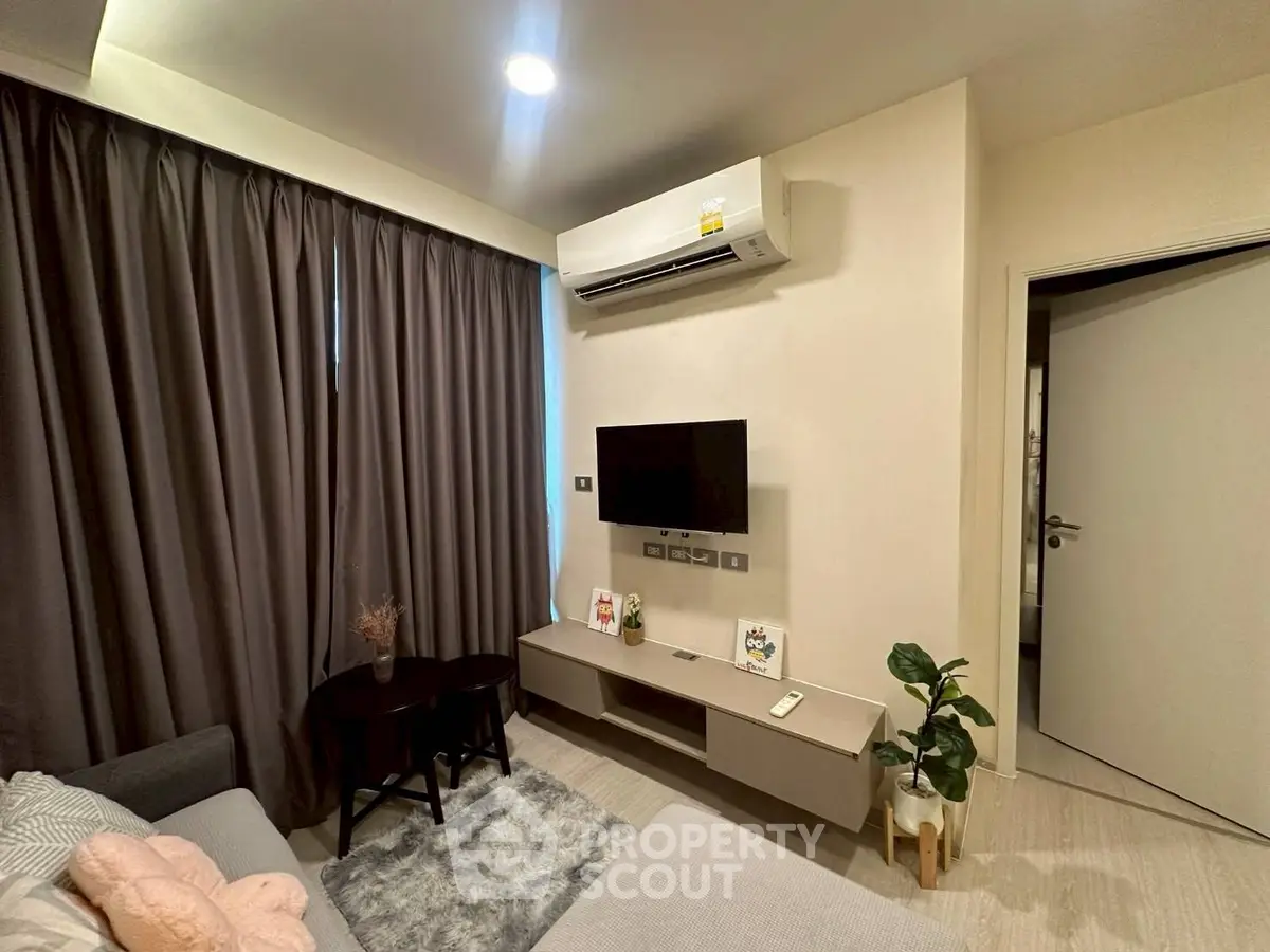 Modern living room with air conditioning and stylish decor