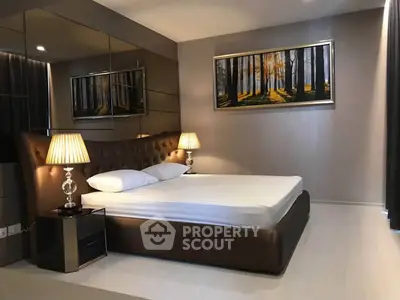 Luxurious modern bedroom with elegant decor and ambient lighting