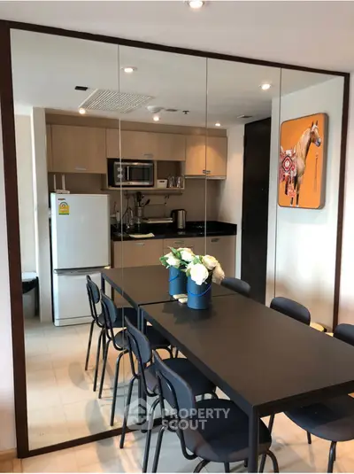 Modern living room with stylish decor and contemporary furniture.