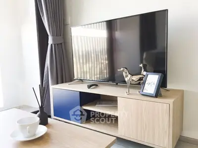 Modern living room with sleek TV setup and stylish decor
