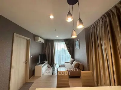 Modern living room with cozy sofa and stylish lighting