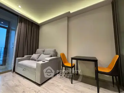 Modern living room with cozy sofa and dining area in stylish apartment