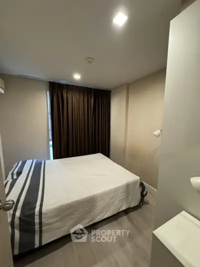 Cozy bedroom with modern decor and natural light