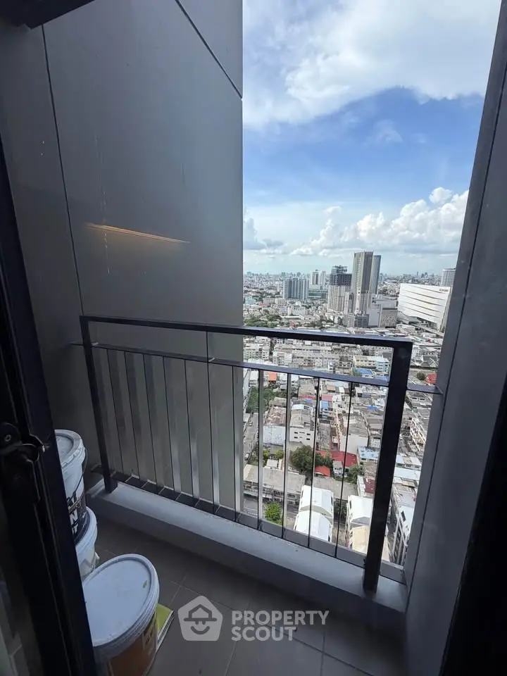 Stunning city view from a high-rise balcony, perfect for urban living enthusiasts.