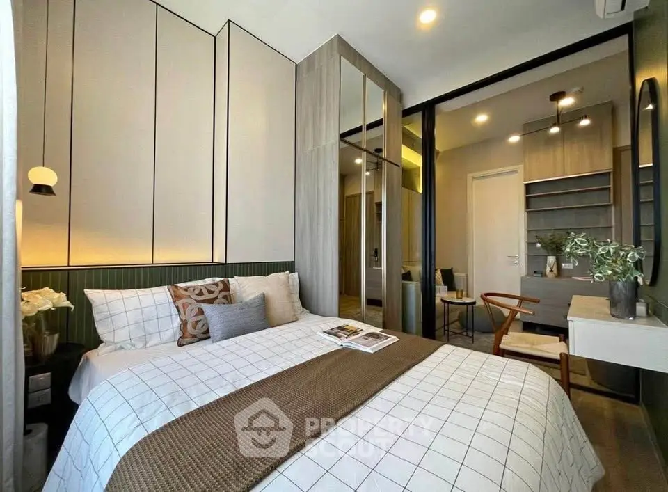 Modern bedroom with stylish decor and cozy ambiance, featuring a comfortable bed and elegant furnishings.