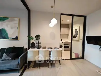 Modern living room with stylish dining area and open kitchen layout