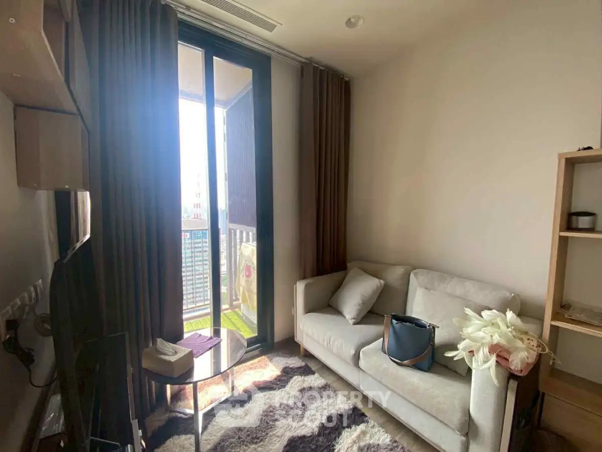 Cozy living room with balcony access and modern decor