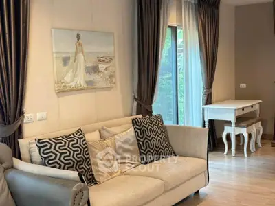Elegant living room with stylish decor and natural light