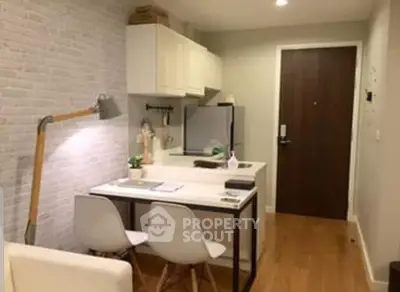 Cozy modern kitchen with dining area and stylish decor