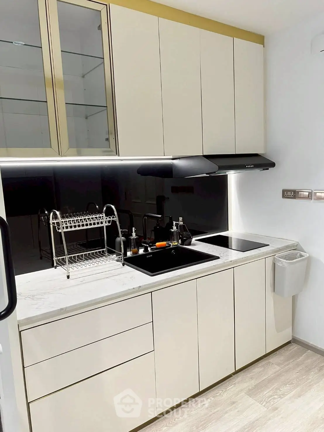 Modern kitchen with sleek cabinetry and induction cooktop