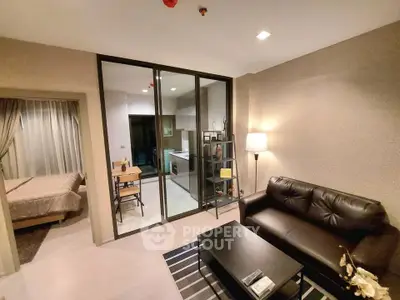 Modern apartment interior with cozy living room and adjacent bedroom