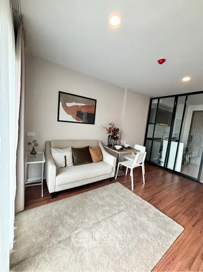 Modern living room with cozy seating and stylish decor