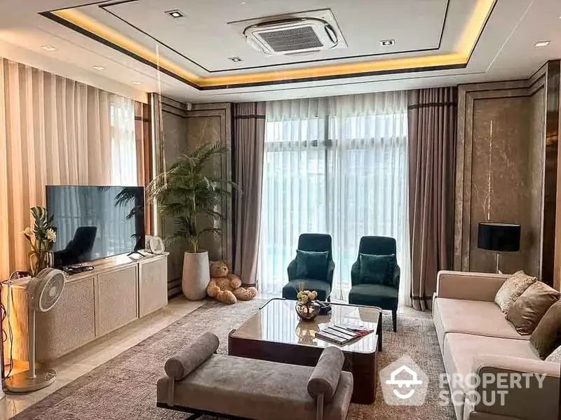 Elegant living room with plush seating, ambient lighting, and modern entertainment unit, perfect for upscale urban living.