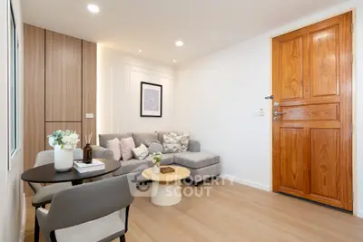 Modern living room with cozy seating and stylish decor