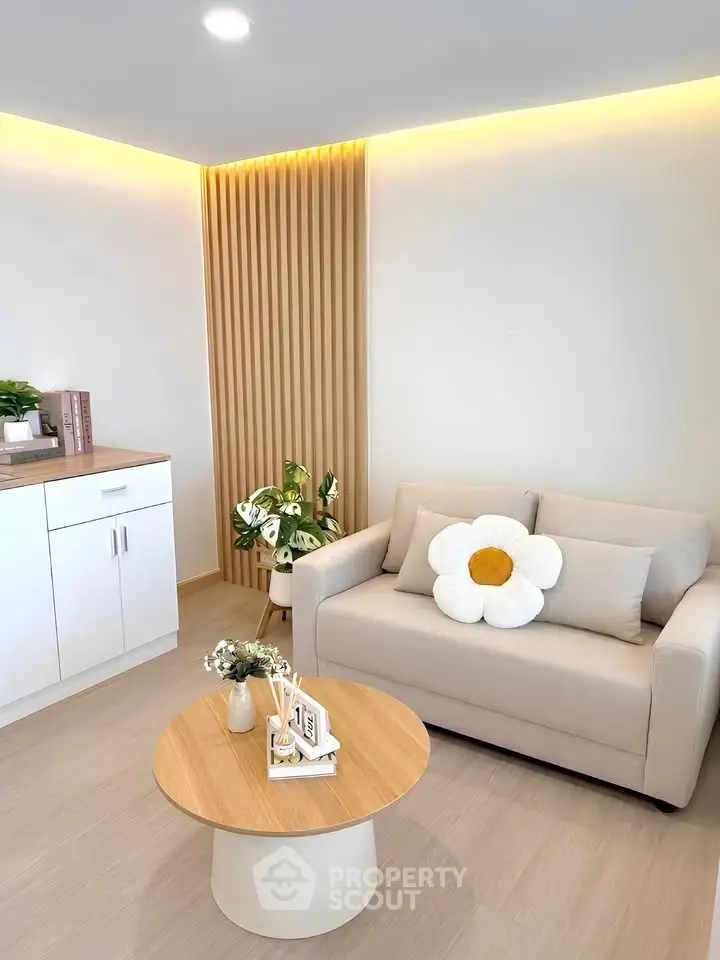 Modern living room with cozy sofa and stylish decor