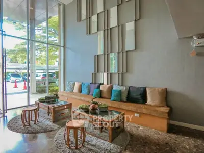 Stylish modern living room with large windows and chic decor