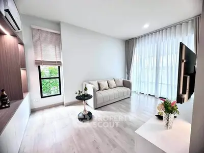 Modern living room with sleek design and natural light