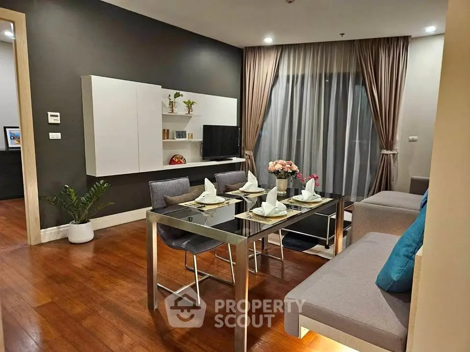 Modern living room with elegant dining area and stylish decor