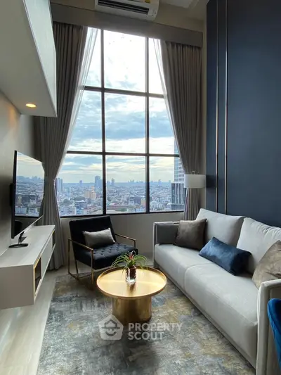Luxurious high-rise living room with stunning city view and modern decor.