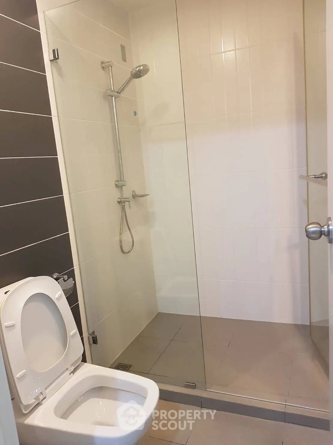 Modern bathroom with glass shower and sleek design