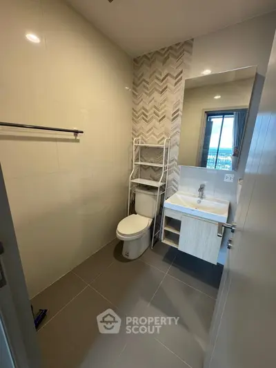 Modern bathroom with sleek design and city view window