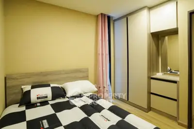 Cozy bedroom with modern wardrobe and stylish decor