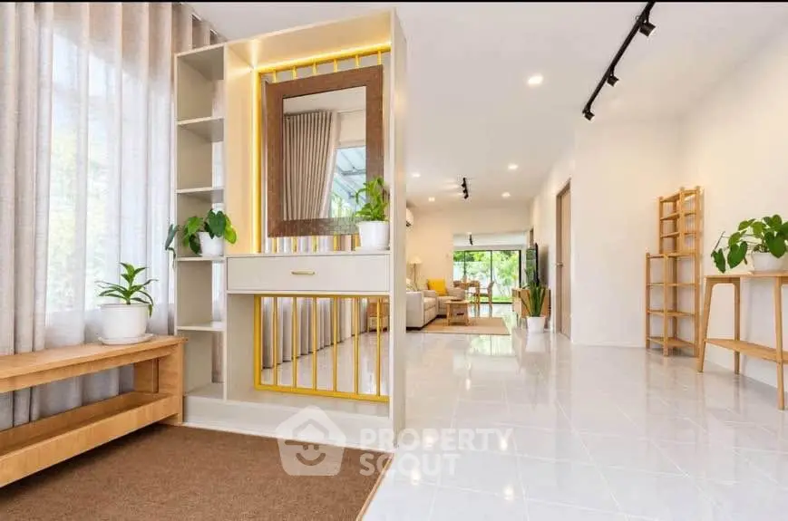 Spacious modern living room with elegant decor and natural light