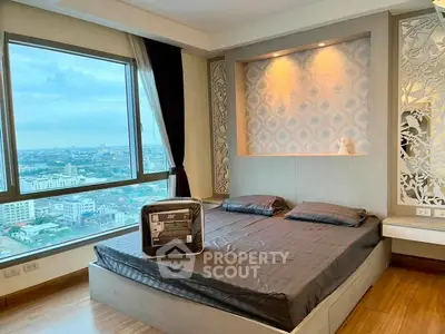 Luxurious bedroom with stunning city view and elegant decor