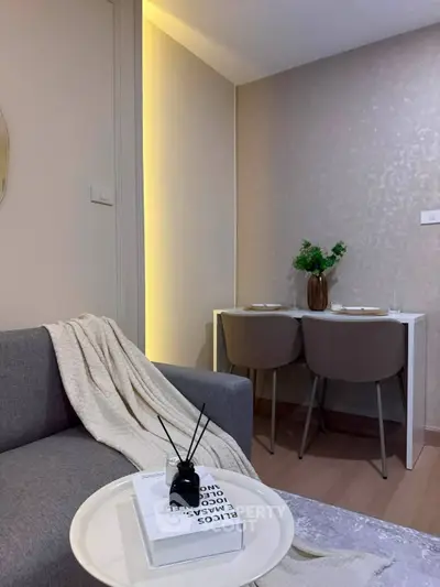 Cozy modern living room with stylish dining area and elegant decor