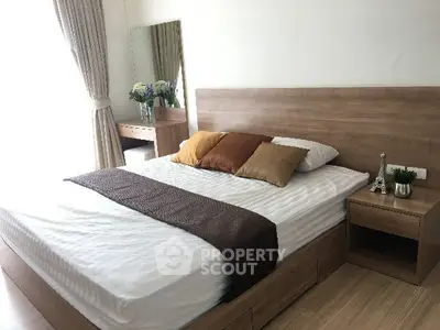Modern bedroom with wooden furniture and natural light