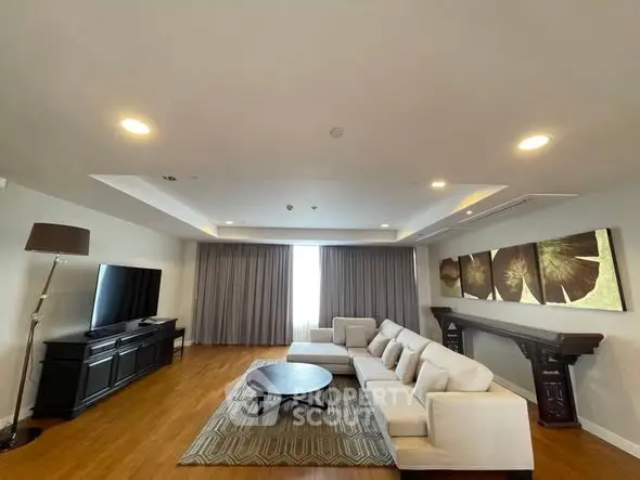 Spacious living room with modern decor and large sectional sofa