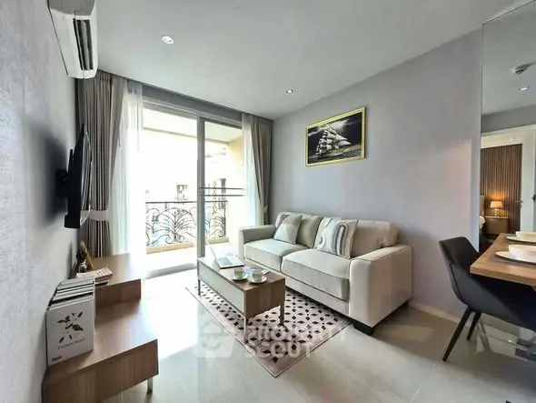 Modern living room with balcony access and stylish decor