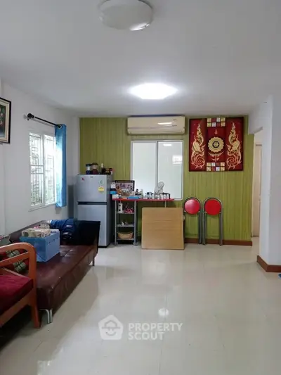 Spacious living room with modern decor and natural light