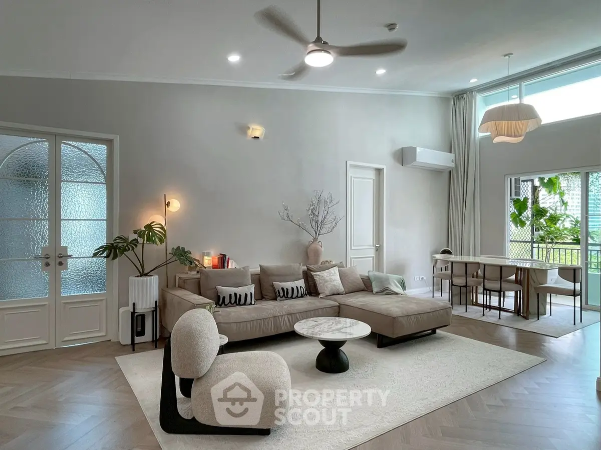 Spacious modern living room with elegant decor and natural light