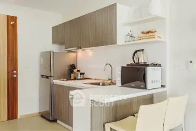 Modern kitchen with sleek appliances and stylish cabinetry