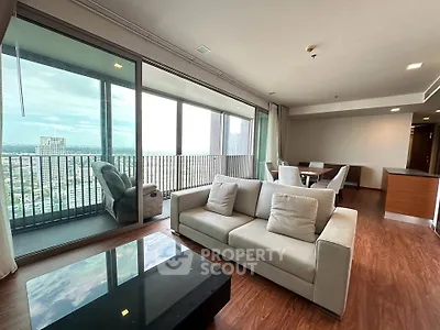Spacious modern living room with large balcony and stunning city view