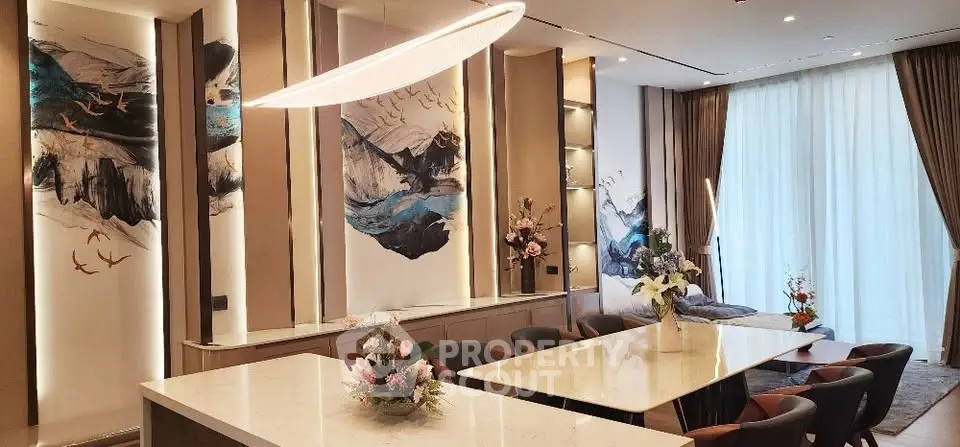 Luxurious modern living room with elegant decor and large windows