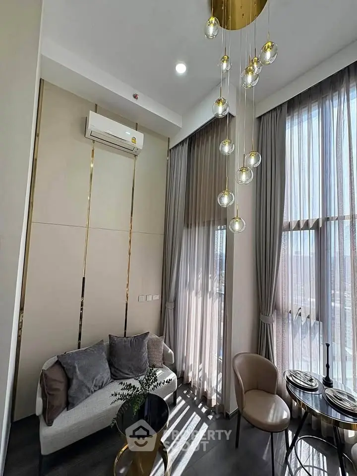 Luxurious modern living room with high ceilings and elegant lighting