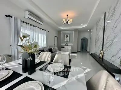 Luxurious modern living room with elegant dining area and stylish decor